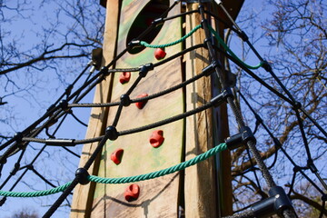 Obraz premium wood panel and green plastic treehouse in public park. playground concept. playground design and ideas theme.