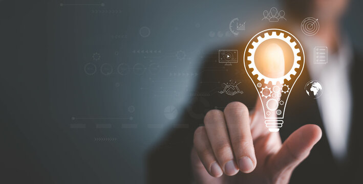 man Hand holding Light bulb Global Internet connection. Business global internet connection application technology and digital marketing, Financial and banking, Digital link tech, big data. - Powered by Adobe