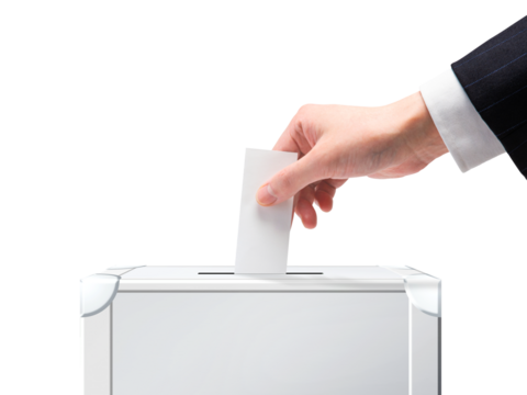 選挙_投票する_国民投票のイメージ素材｜投票箱に投票用紙を入れる手