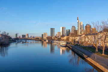 scenic view to skyline of Frankfurt am Main with reflection of the skyline in river Main