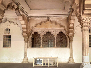 The famous red fort in the city of Agra, India. Tourists visit a popular tourist attraction.
