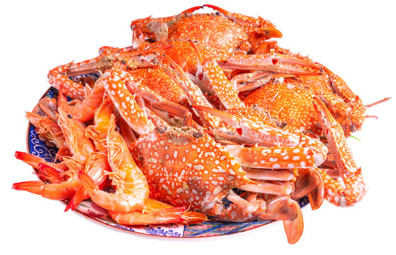 Seafood dish, steamed and cooked blue crab on white PNG File.