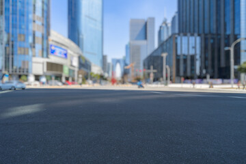 Fototapeta na wymiar cityscape and skyline of suzhou from empty asphalt road