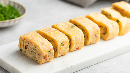 Tamagoyaki, Japanese rolled omelette, selective focus. Japanese traditional food