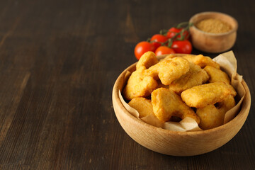 Concept of tasty fast food, nuggets, space for text