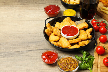 Concept of tasty fast food, nuggets, space for text
