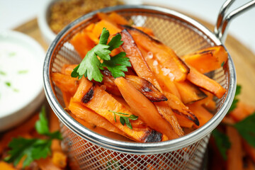 Concept of tasty food, fried sweet potato, close up