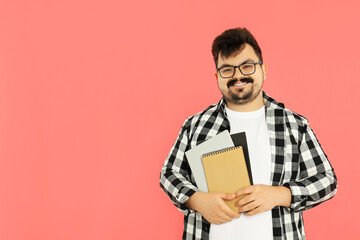 Concept of people, young fat man on pink background