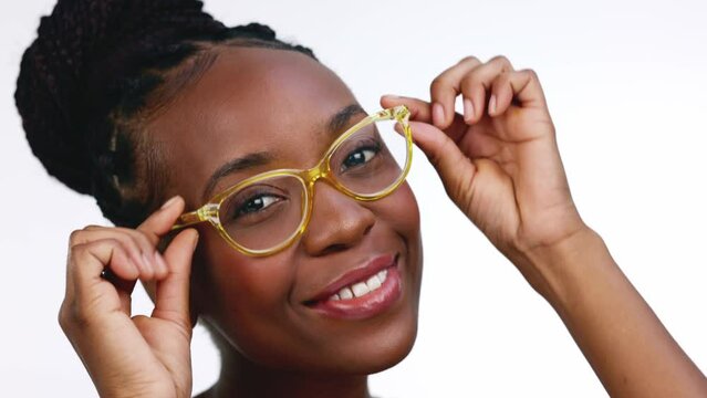 Face, black woman and glasses for vision, happiness and smart lady isolated on white studio background. Portrait, African American female and girl with eyewear, funny and goofy with joy and smile
