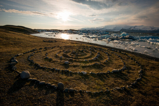 Concentric rings of rocks on a plateau overlooking Jokulsarlon glacier lagoon in Iceland.