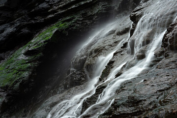 Fototapeta premium Close up of a silky Waterfall in As Catedrais beach (Cathedrals beach). Lugo, Galicia, Spain