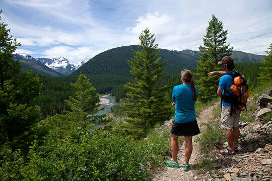 Kayakers take a break to hike and take in some views along the Middle Fork of the Flathead River, Montana.