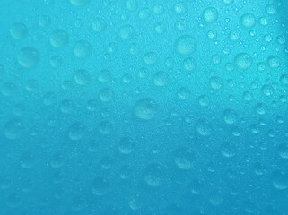 Top veiw, Abstract blurred blue water dropslet texture background for design or stock photo, illustration, rippled water