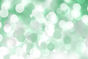 Abstract light green and white delicate colorful pastel spring or summer bokeh background with glittering stars and space. Beautiful modern graphic design texture.