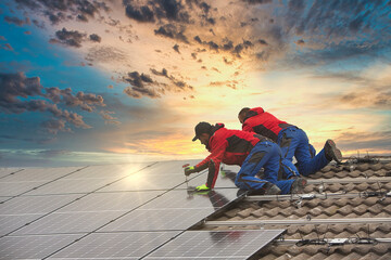 Installing solar photovoltaic panel system. Solar panel technician installing solar panels on roof....
