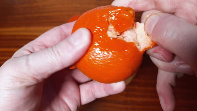 Peeling of tangerine Murcott from a skin