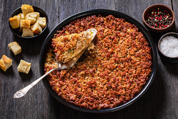Tasty Bake with meat, mushrooms, cheese, onion