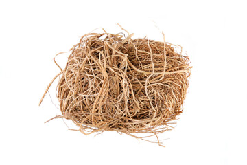 Overhead view of dried vetiver root (Vetiveria zizanioides), isolated on white background