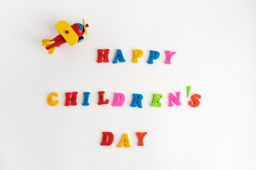 Happy Children's Day Colorful text, a little airplane