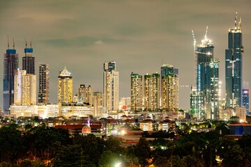 Fototapeta na wymiar Jakarta, Indonesia Aerial view of Jakarta's Central Business District Jakarta cityscape at sunset. Panorama/widescreen photo
