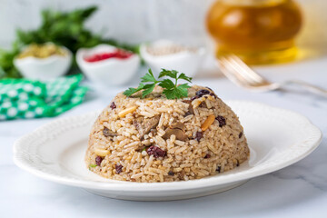 Traditional delicious Turkish food; rice pilaf with pine nuts and currants (Turkish name; ic pilav or pilaf)