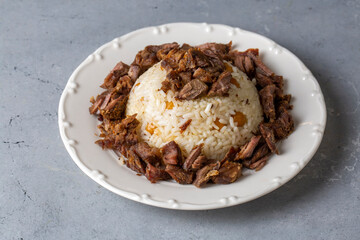 Traditional Turkish food; Roasted meat on rice (Turkish name; pilav üstü kavurma, kurban kavurma, nohutlu etli pilav)