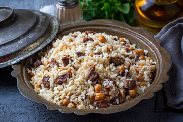 Traditional Turkish food; Roasted meat on rice (Turkish name; pilav üstü kavurma, kurban kavurma, nohutlu etli pilav)