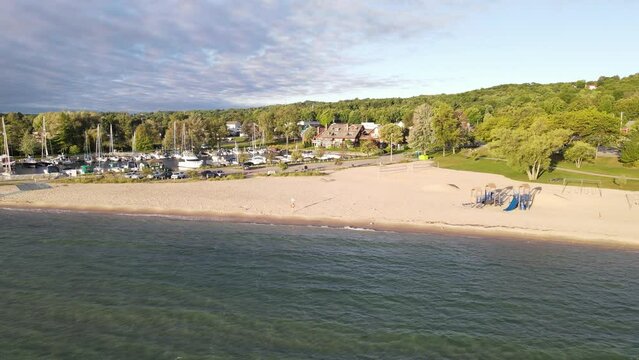 Sandy beach of Suttons Bay in Michigan, aerial drone view