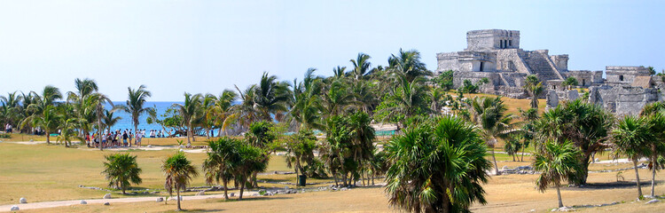 Panoramic view of the archaeological site of the ancient Mayan city of Tulum, dominated by El...