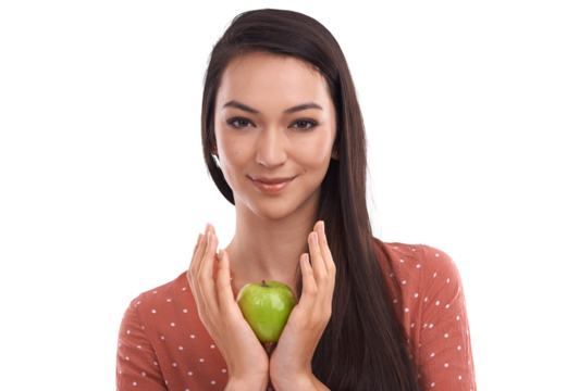 A happy female nutritionist with an apple or a healthy vegan girl with fruit products for a weight loss diet, body detox, or wellness lifestyle, health-conscious isolated on a PNG background.