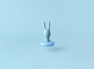 Creative easter minimal concept.Blue background with rabbit shadow.