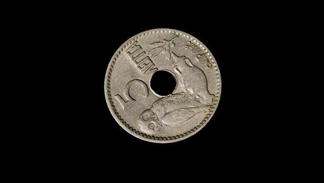 Reverse of old Greece coin 5 lepta 1912 with image of an owl, isolated in black background. 4k video.