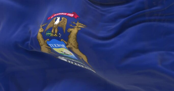 Detail of Michigan state flag waving