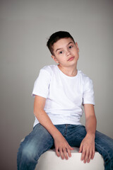 boy in white t-shirt and jeans
