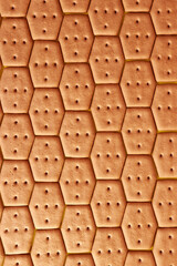 We lay out the background from hexagonal cookies. A tasty and sweet snack.