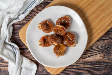 Walnut stuffed figs. Traditional Turkish sweets. Fig dessert with sherbet and walnuts. Top view