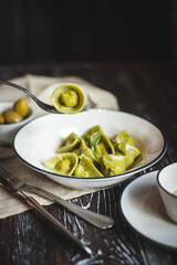 Appetizing Italian food on a dark wooden table. Food photography. Still life