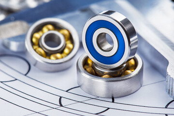 bearings of different types, micrometer, caliper and ruler on the drawings of technical products. Technologies and engineering.