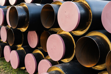 Metal drinking water pipes with plastic covers.