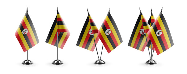 Obraz premium Small national flags of the Uganda on a white background