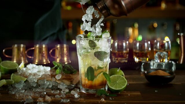 Super slow motion of making mojito cocktail with camera movement. Filmed on high speed cinema camera with cinebot, 1000 fps.