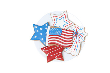 Plate with 4 july cookies isolated on white background