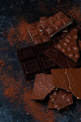 Chocolate bars on a dark background close-up