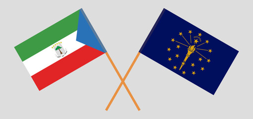 Crossed flags of Equatorial Guinea and the State of Indiana. Official colors. Correct proportion