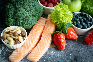 Healthy food selection: fruits, vegetables, nuts, superfoods, berries, leafy vegetables