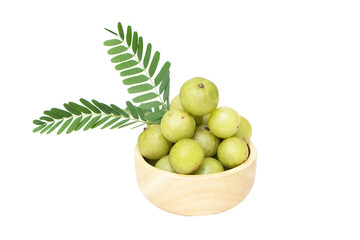 Indian gooseberry whole with leaves on the wood cup fruits Amla berry (phyllanthus emblica)...