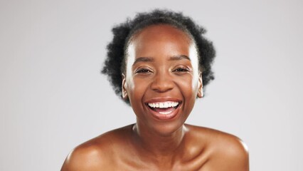 Face, skincare and black woman blowing kiss in studio isolated on a gray background. Portrait, makeup cosmetics and laughing female model blow air kisses for self love, romantic smile and beauty. - Powered by Adobe