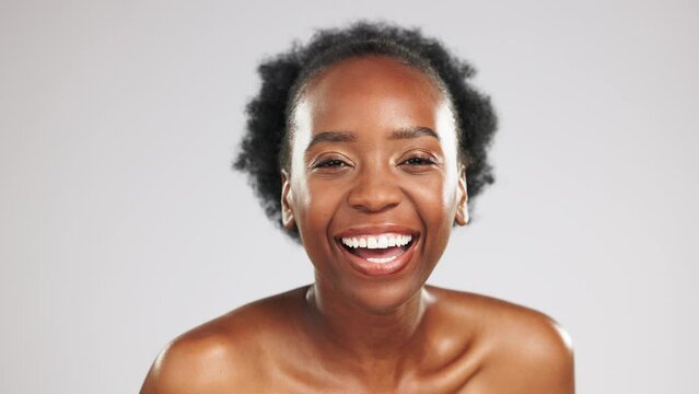 Face, Skincare And Black Woman Blowing Kiss In Studio Isolated On A Gray Background. Portrait, Makeup Cosmetics And Laughing Female Model Blow Air Kisses For Self Love, Romantic Smile And Beauty.