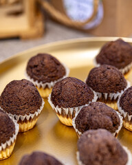 Handmade dark chocolate truffles topped with chocolate shavings, a decadent and indulgent dessert for any occasion