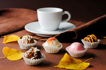 Chocolate truffles and a cup of coffe or tea